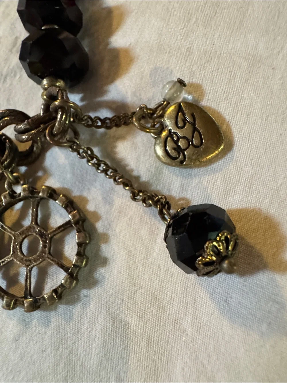 This piece is a RARE vintage Betsey Johnson Y2K COMPLETE Charm Bracelet.